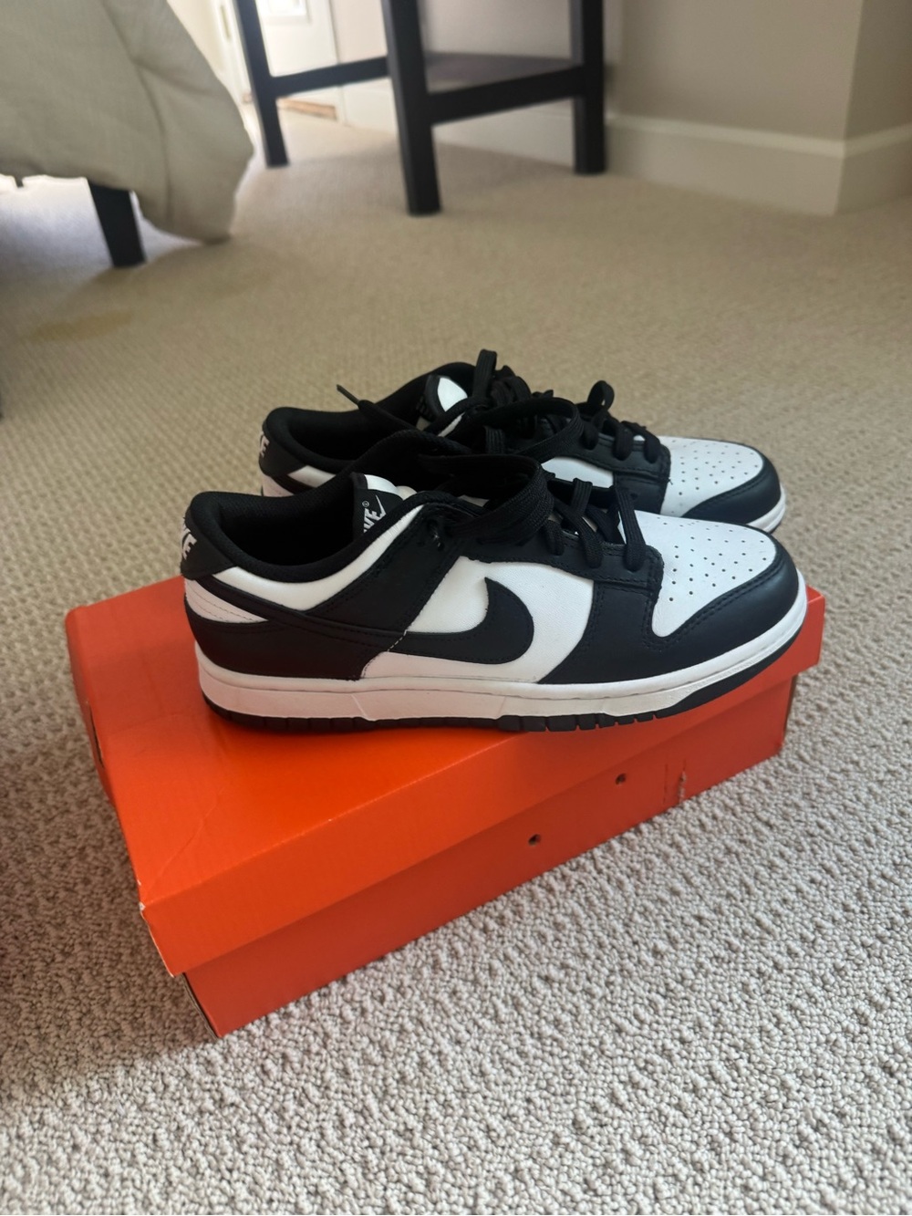 Nike Black and White Low-Top Sneakers with Bold Swoosh